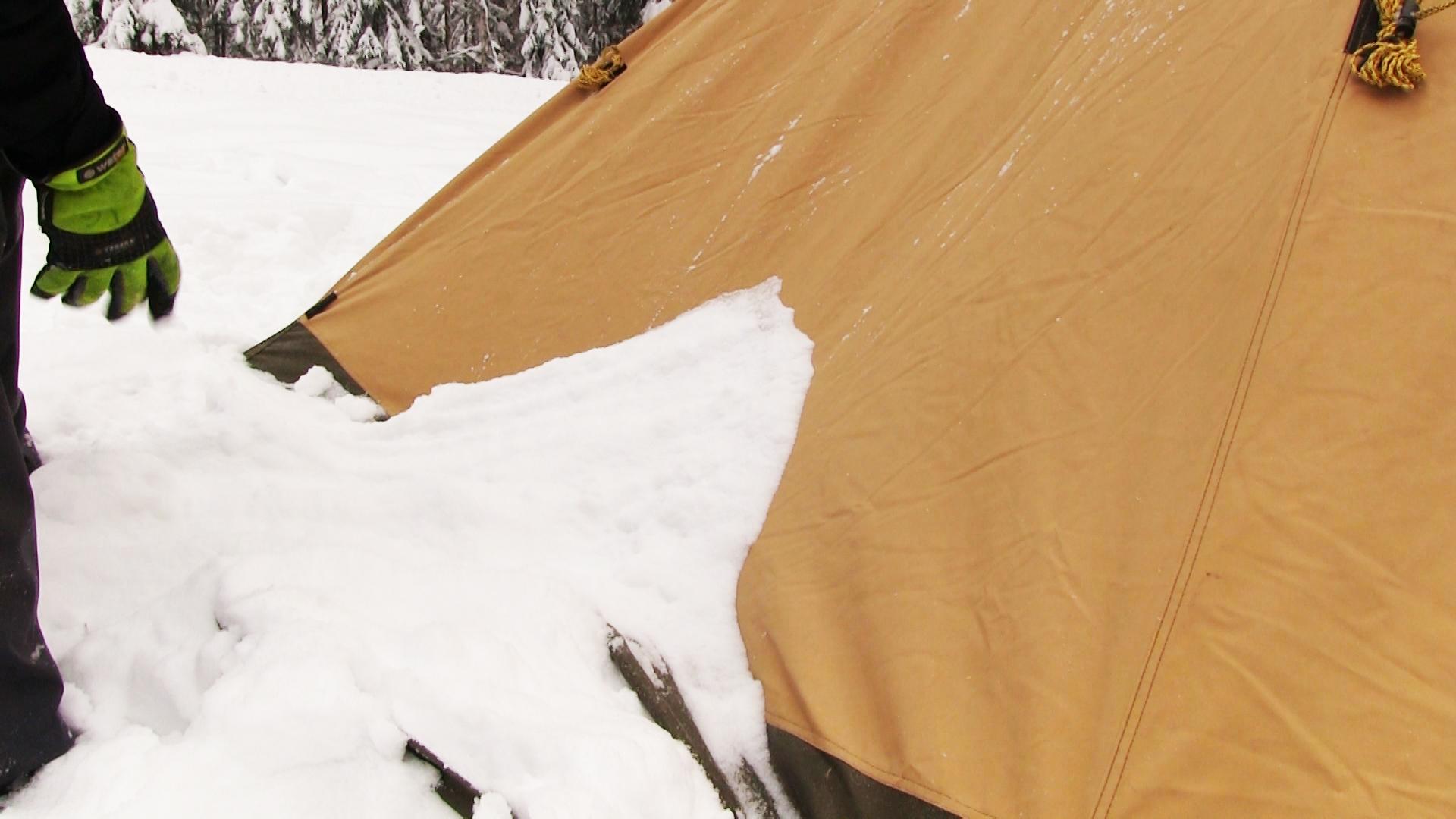 AA How to avoid damages from snow on the Nordic tipi snow build on tent wall