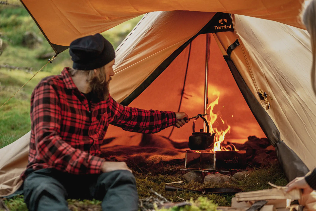 Olivin 2 cp Nordic tipi with open fire in the tent